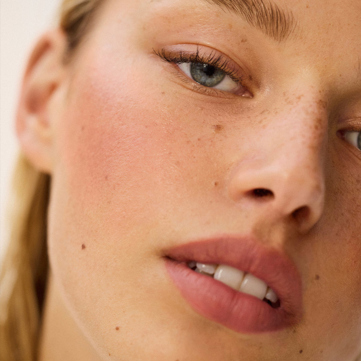 Light skin tone model wearing Impressionist Multistick in Intuition